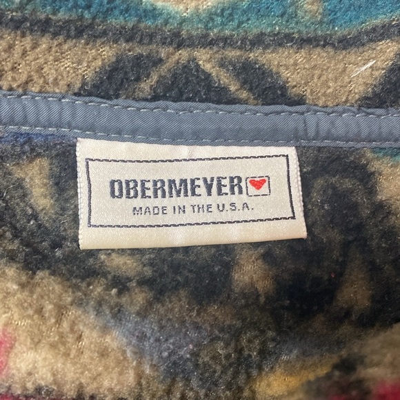 Obermeyer patterned  t-snap pullover shown on a size 6 mannequin - Picture 3 of 3